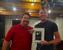 2022 Top Gun Champion, Jonathan Wright being awarded his plaque by President, Kelly Price. 1/21/23
